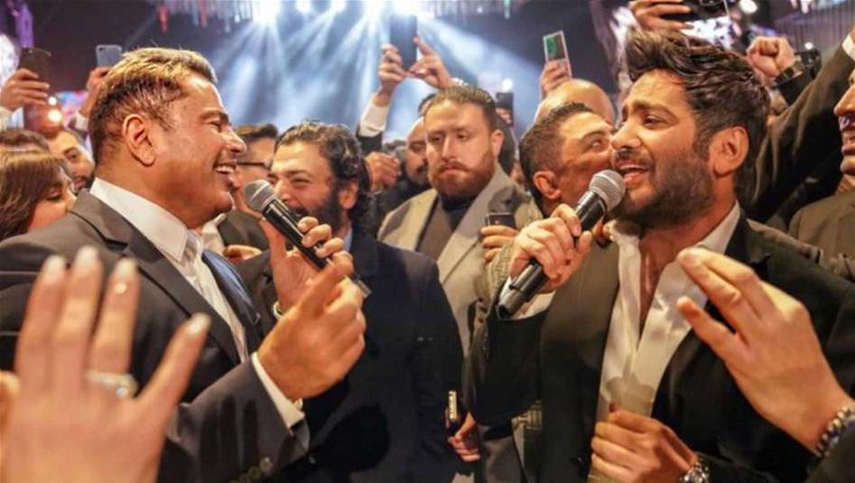لأول مرة.. عمرو دياب وتامر حسني يغنيان سويا (فيديو)