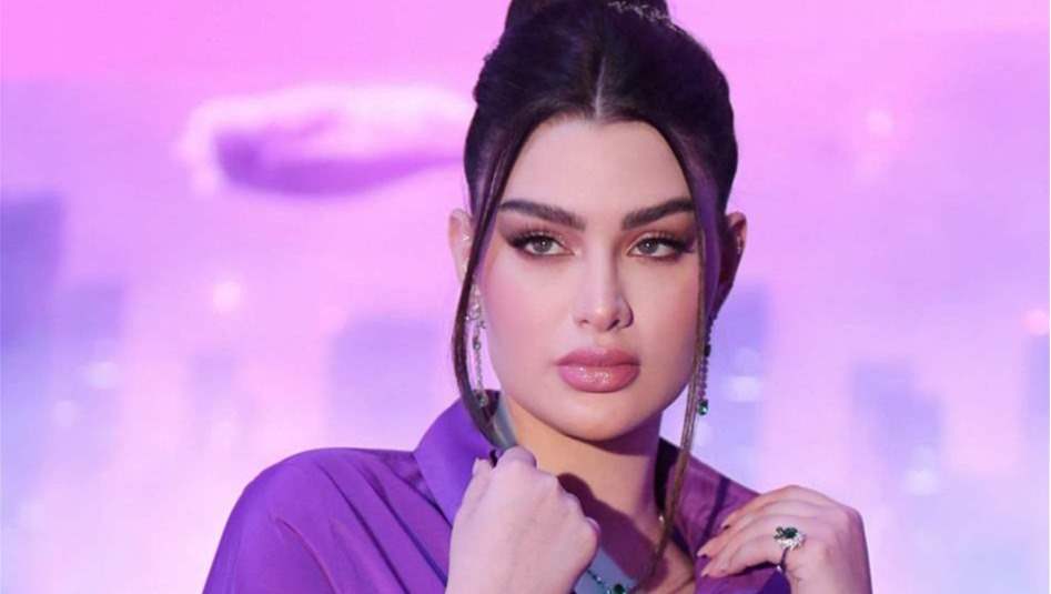 رقص &quot;ساخن&quot; لروان بن حسين أمام علم إيران يشعل مواقع التواصل (فيديو)