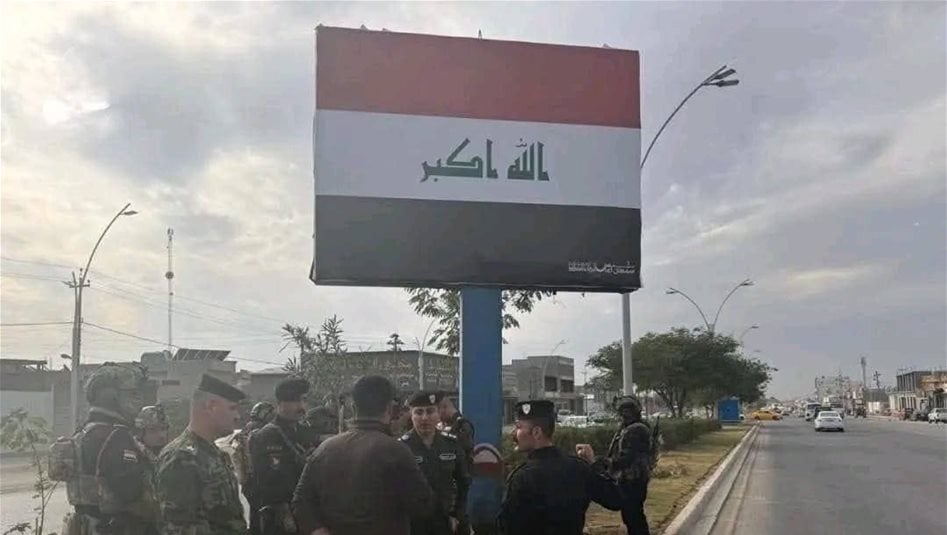 بعد حرقه.. القوات الأمنية تعيد نصب العلم العراقي في كركوك