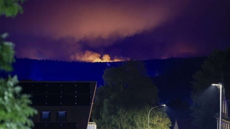 Yağış ve nem orman yangınının Almanya sınırına ilerlemesini durdurdu