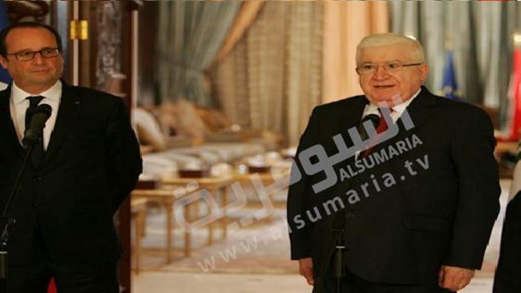 وصول الرئيسين العراقي والفرنسي الى مقر مؤتمر باريس