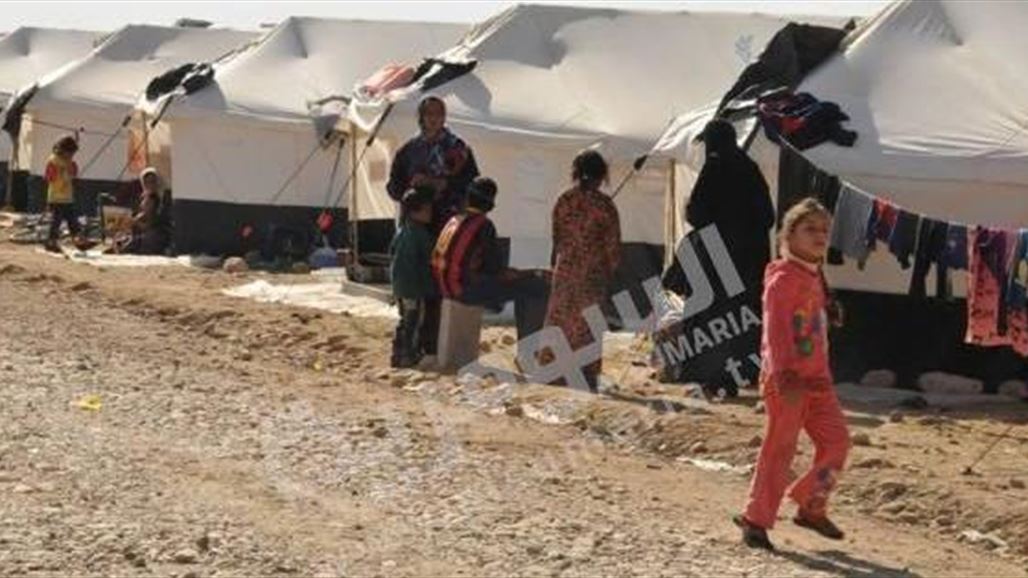 توزيع 100 ألف دينار لكل عائلة نازحة في مخيم ليلان شرقي كركوك