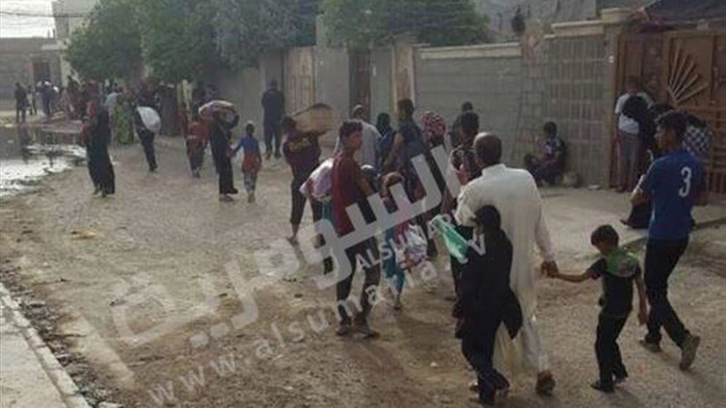 نزوح مئات الاسر من منطقة البوفراج بالرمادي بعد دخول داعش اليها