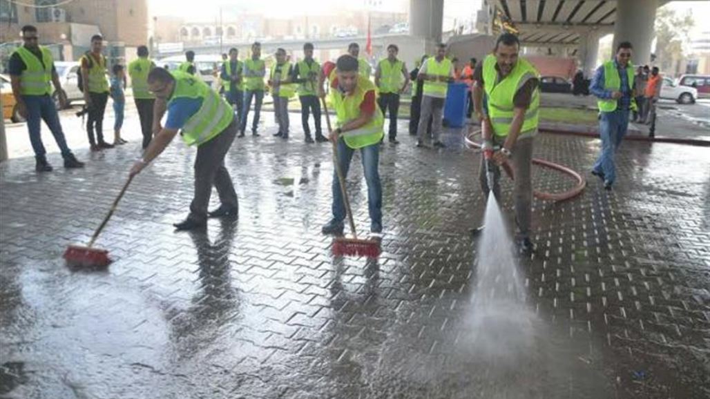 اعلاميون بالنجف يشاركون بحملة لتنظيف شوارع المدينة