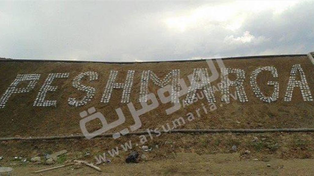 مقاتل بالبيشمركة يحول سواتر مواجهة "داعش" الى منحوتات فنية