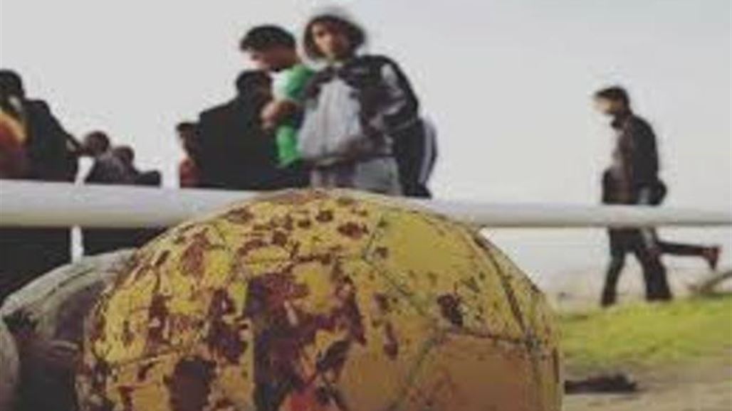 اتحادا كربلاء وبابل يوقدان الشموع في مكان تفجير ملعب الاسكندرية