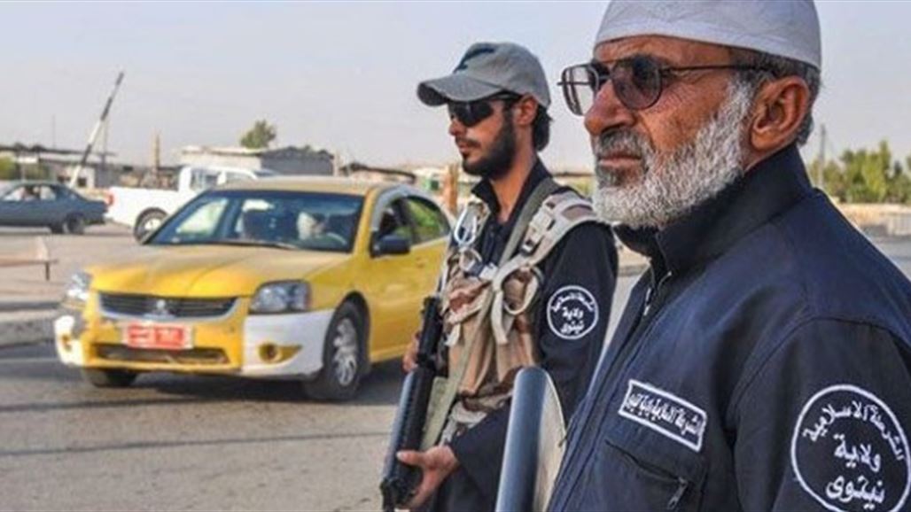 داعش يفرض راياته على الملابس في الموصل