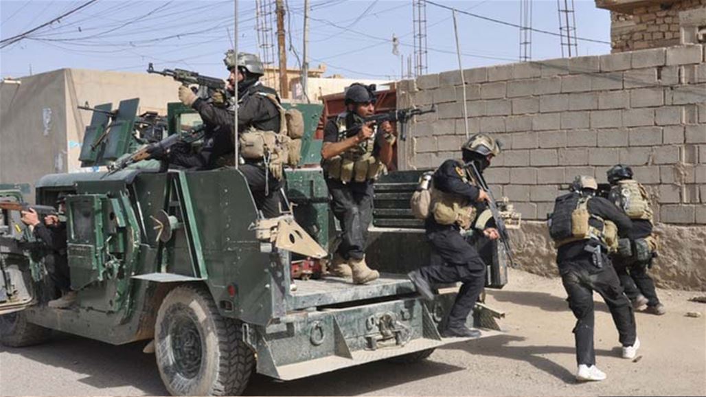 جهاز مكافحة الارهاب يحرر حي الانتصار بالرطبة ويرفع العلم العراقي فوق احد مبانيه