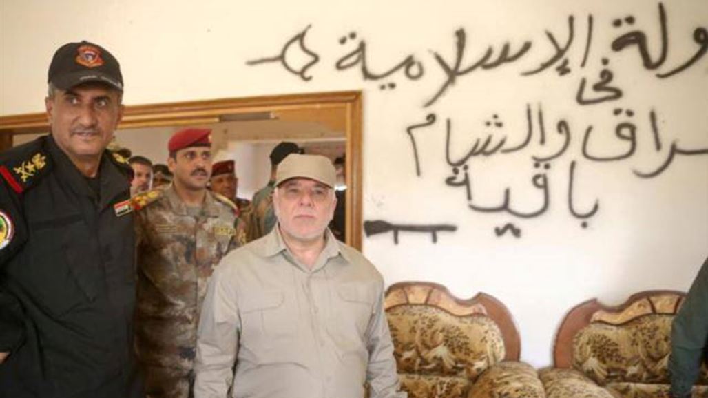 العبادي يتفقد المقاتلين بحي الشهداء في الفلوجة