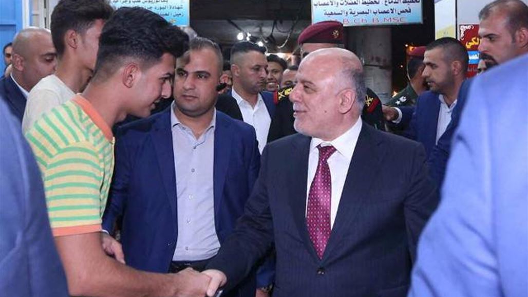 العبادي يجري جولة في أسواق ميسان