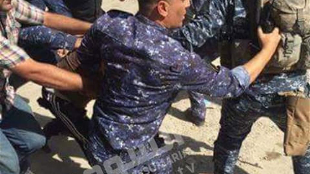 اعتقال شاب يرتدي عباءة نسائية حاول الدخول الى مدرسة بالكرادة