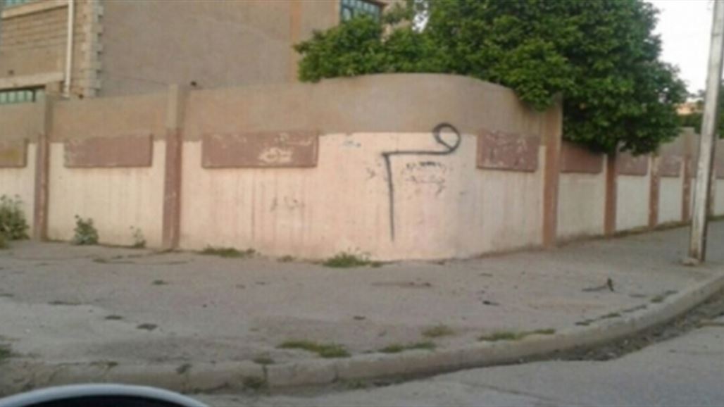 "المقاومة الشعبية" ترفع العلم العراقي فوق اكبر مقار "داعش" في الموصل