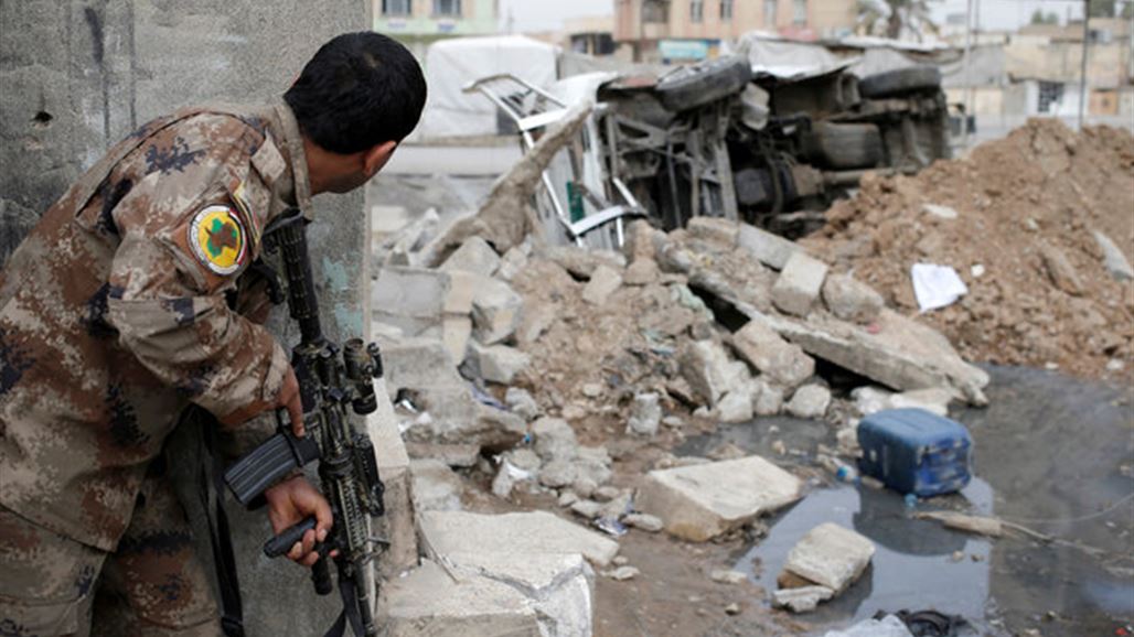 إعتقال أربعة من "داعش" مختبئين بمنزل سكني في حي الزهراء بالموصل