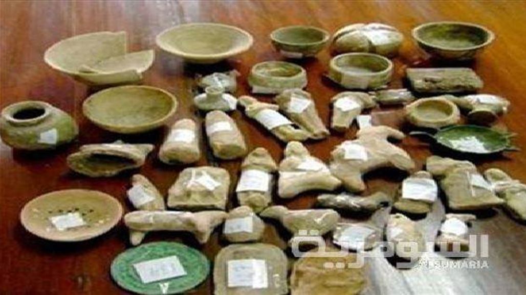 شرطة النجف تعلن ضبط 35 قطعة أثرية مخبأة بعجلة