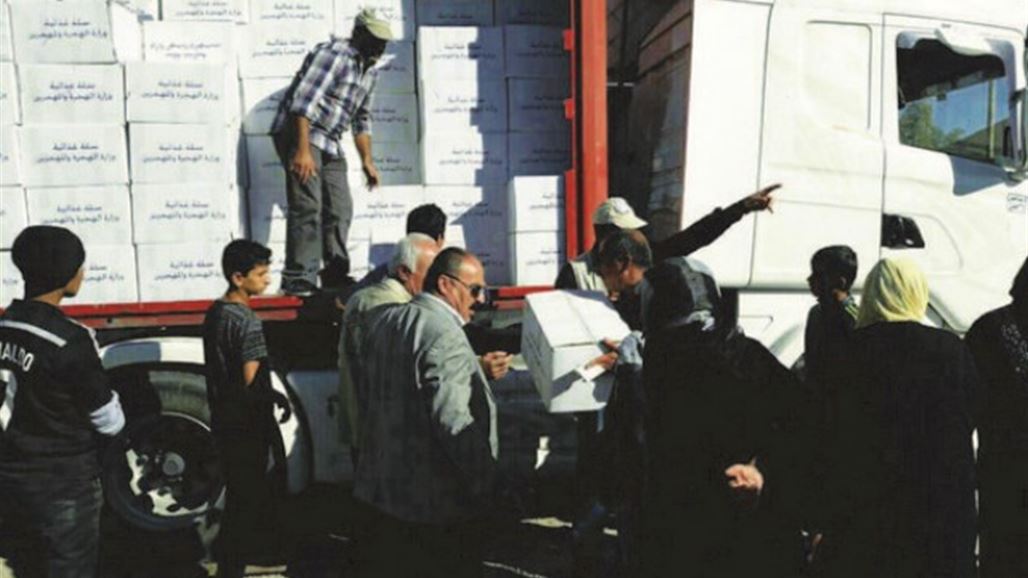 الهجرة: نوزع المساعدات الاغاثية وسط قصف داعشي بقذائف الهاون بالموصل
