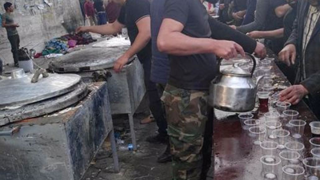 الالآف يتوافدون الى ساحة التحرير ببغداد وسط اجراءات امنية مشددة