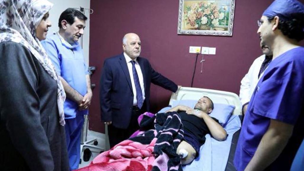 العبادي يوجه بتسهيل اجراءات مساعدة جرحى العمليات العسكرية