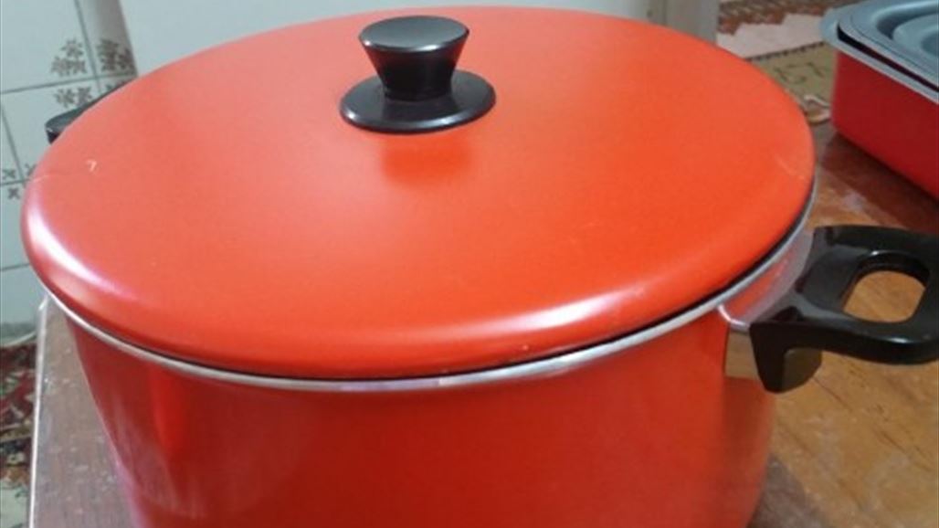 بالصور..انقاذ طفل من داخل قدر صغير في كركوك