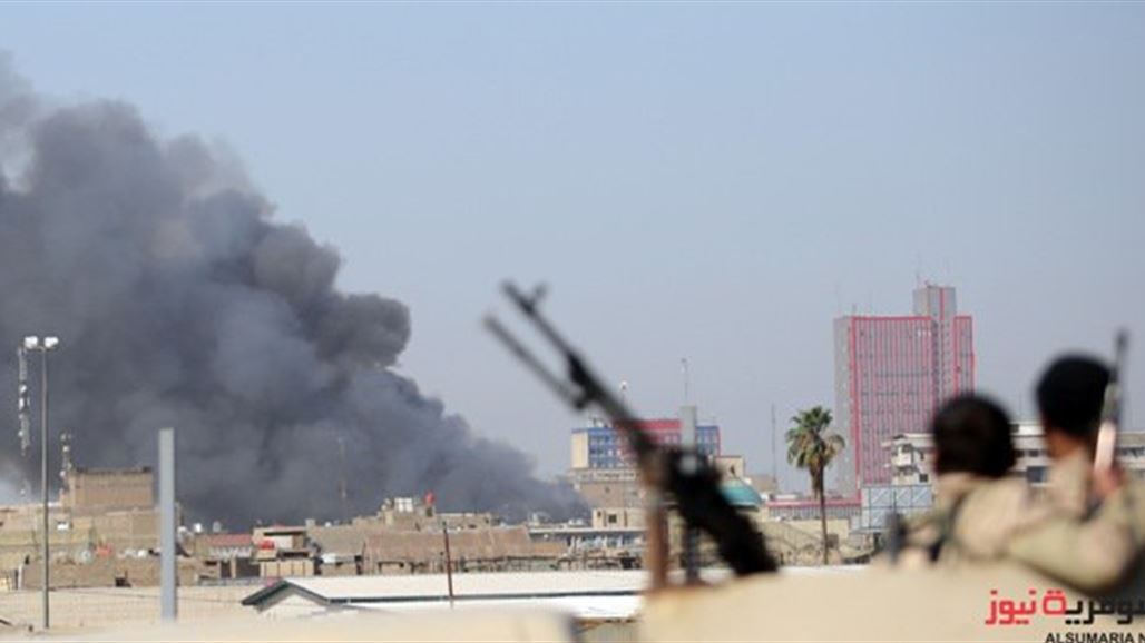 اندلاع حريق في عمارة تضم مخازن تجارية وسط بغداد