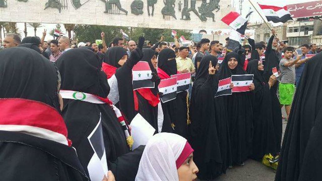انطلاق تظاهرة في ساحة التحرير وسط بغداد تندد بالقصف على سوريا