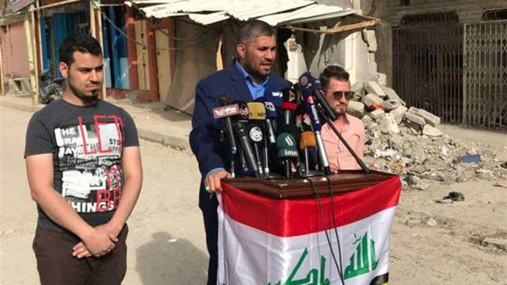 فصيل مقرب من السيستاني يدعو من "ركام الموصل" إلى تكثيف الجهود لبنائها