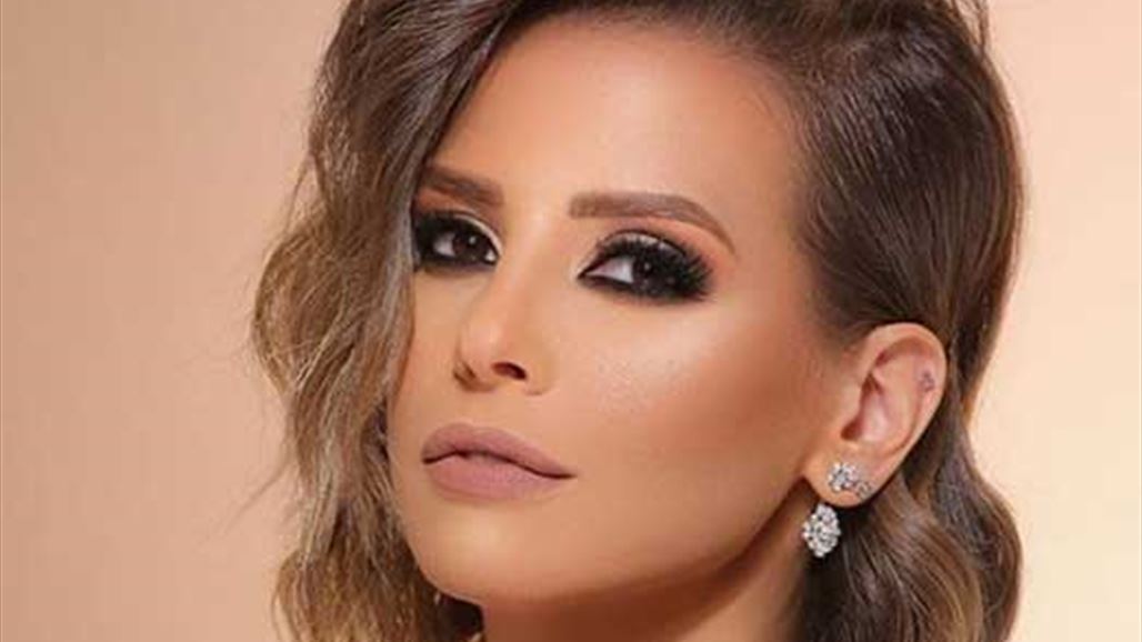 للمر ة الأولى إيمان العاصي تصدم جمهورها بهذا الفستان!