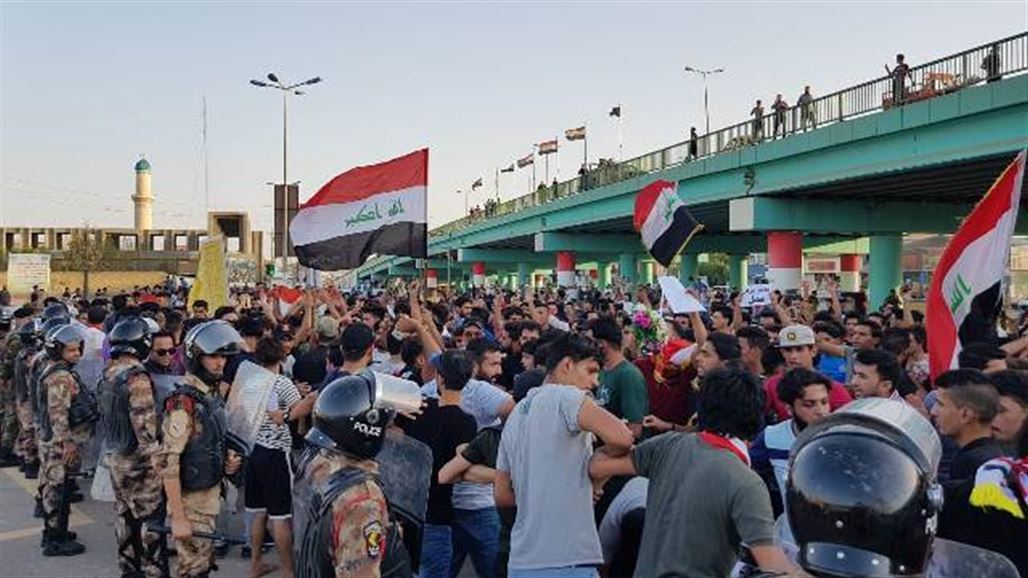 متظاهرون في ميسان يحاولون اقتحام مبنى مجلس المحافظة والقوات الامنية تمنعهم