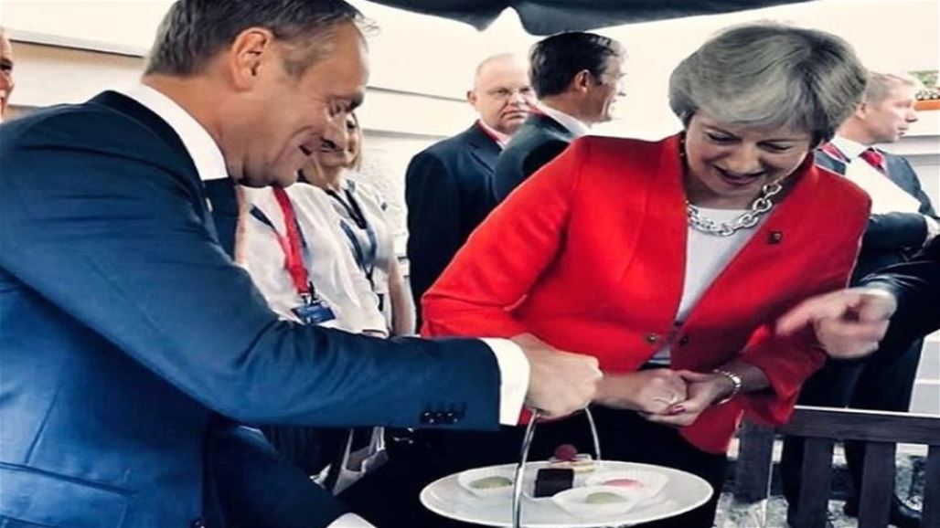 بالصورة.. "قطعة حلوى" لرئيسة وزراء بريطانيا تضع الاتحاد الأوروبي في "موقف محرج"