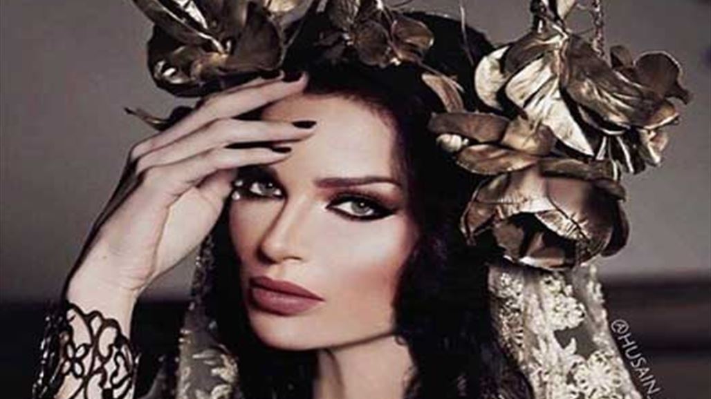 رسام عراقي يبهر نادين نجيم بلوحة من الذهب!