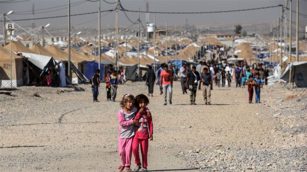 الهجرة تعيد 444 نازحا عراقيا من مخيم الهول السوري لمخيمات الموصل