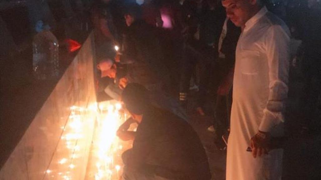 أهالي المثنى يوقدون الشموع على نهر السماوة تضامنا مع فاجعة الموصل
