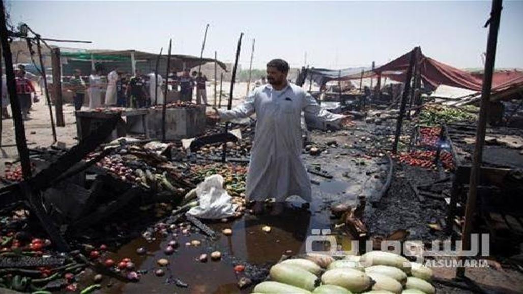 12 قتيلا وجريحا بتفجير انتحاري استهدف سوقا شعبية جنوب بغداد