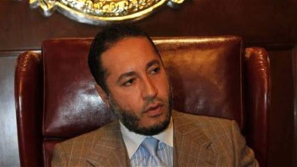 نجل القذافي يعتذر للشعب الليبي