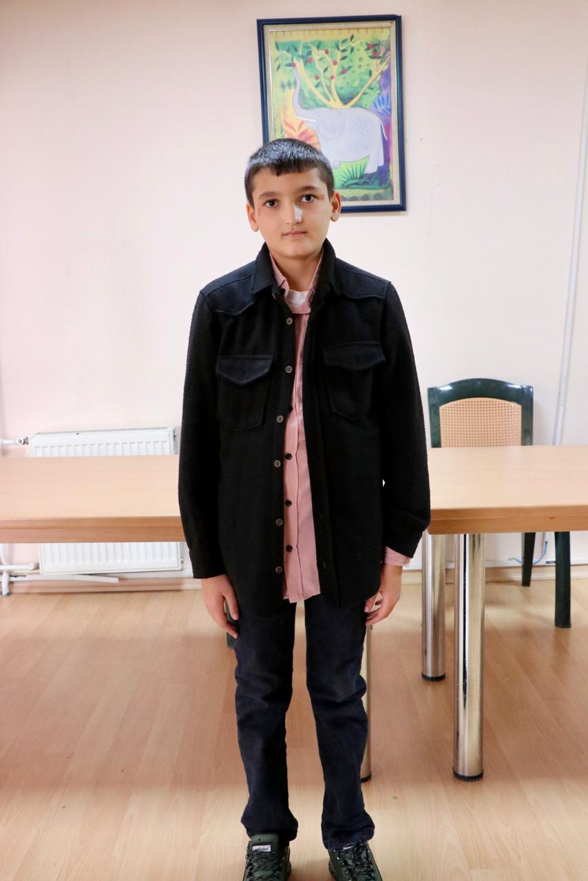 بالصور.. لحظة إعادة الطفل العراقي المختطف لدى داعش منذ 2014